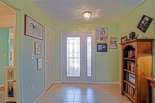 14004 SE 94th Ave, Summerfield, FL 34491 - tiled foyer entrance featuring baseboards