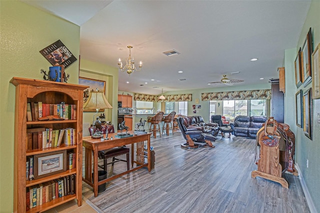 14004 SE 94th Ave, Summerfield, FL 34491 - dining room with wood finished floors, a chandelier, ceiling fan, and recessed lighting