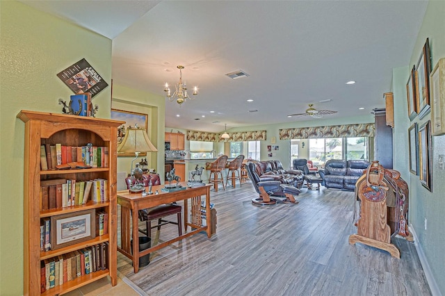 14004 SE 94th Ave, Summerfield, FL 34491 - dining area with light wood-style floors, a chandelier, a ceiling fan, and recessed lighting