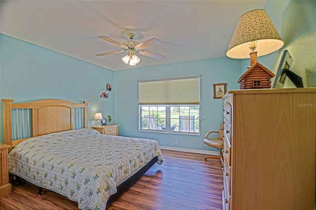 14004 SE 94th Ave, Summerfield, FL 34491 - bedroom featuring wood finished floors, baseboards, and a ceiling fan