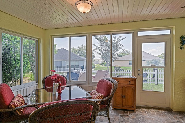 14004 SE 94th Ave, Summerfield, FL 34491 - sunroom with stone finish flooring and healthy amount of natural light