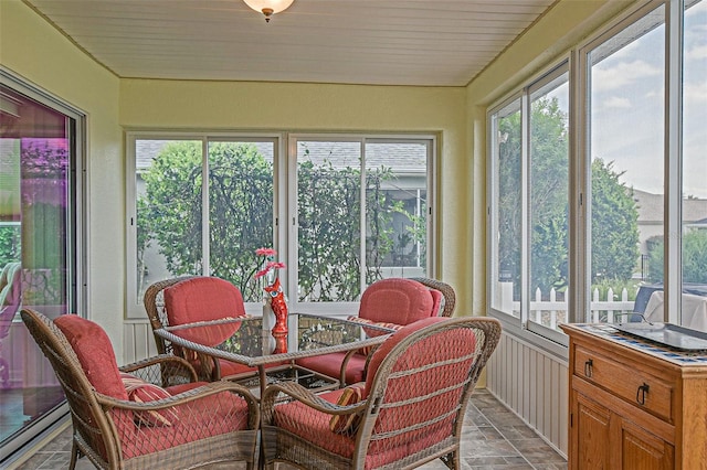 14004 SE 94th Ave, Summerfield, FL 34491 - sunroom / solarium with plenty of natural light and stone finish flooring