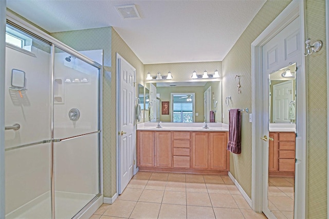 14004 SE 94th Ave, Summerfield, FL 34491 - full bathroom with a shower stall, tile patterned flooring, double vanity, and plenty of natural light