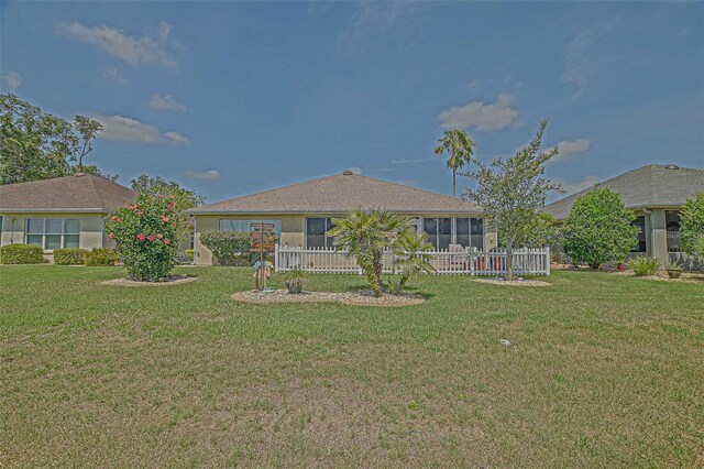 14004 SE 94th Ave, Summerfield, FL 34491 - rear view of house with a sunroom