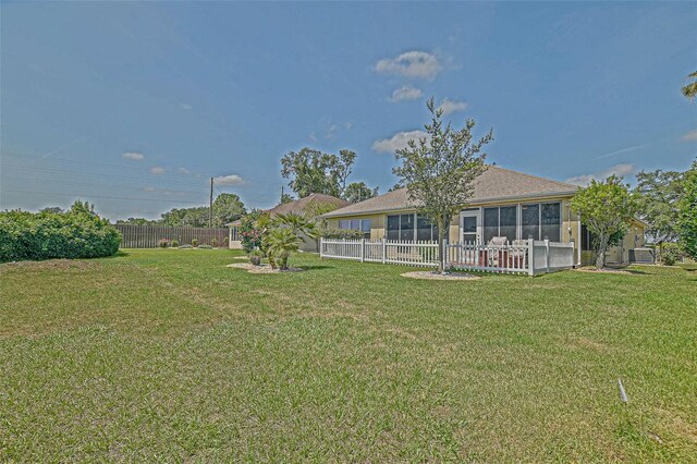 14004 SE 94th Ave, Summerfield, FL 34491 - view of yard with a sunroom