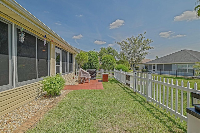 14004 SE 94th Ave, Summerfield, FL 34491 - view of yard with a patio and a sunroom