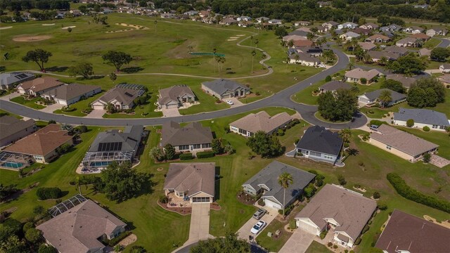 14004 SE 94th Ave, Summerfield, FL 34491 - aerial view of property and surrounding area with nearby suburban area
