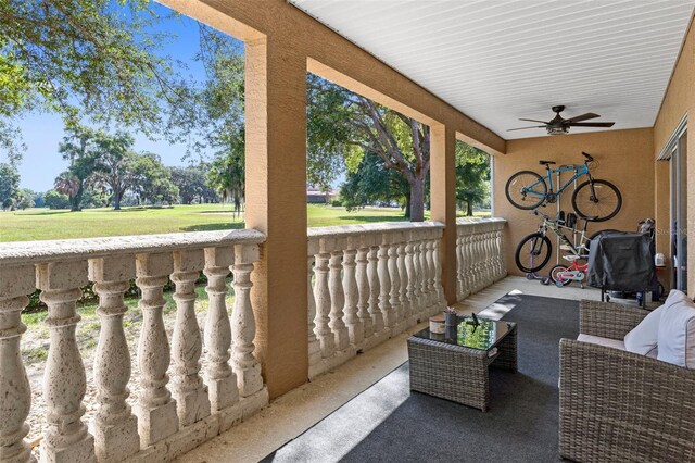 4450 E Windmill Dr Unit 101, Inverness, FL 34453 - view of patio / terrace featuring a ceiling fan