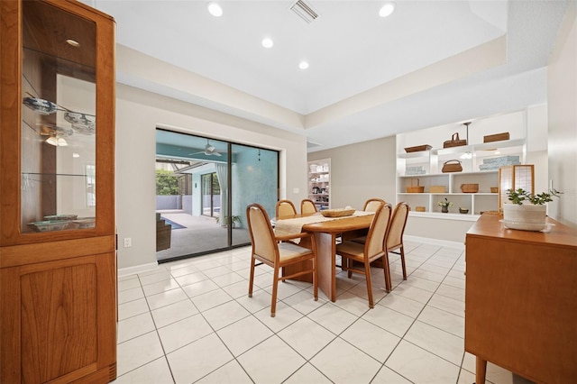 451 E Ireland Ct, Hernando, FL 34442 - dining room with light tile patterned floors, a tray ceiling, recessed lighting, and baseboards