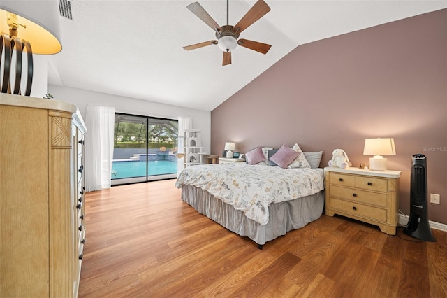 451 E Ireland Ct, Hernando, FL 34442 - bedroom featuring access to outside, vaulted ceiling, wood finished floors, and ceiling fan