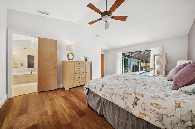 451 E Ireland Ct, Hernando, FL 34442 - bedroom with access to exterior, lofted ceiling, wood finished floors, ensuite bath, and a ceiling fan