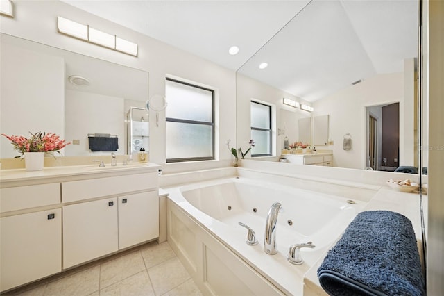 451 E Ireland Ct, Hernando, FL 34442 - full bath featuring vanity, a tub with jets, tile patterned floors, a stall shower, and lofted ceiling