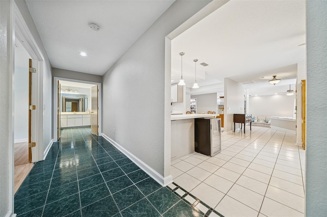 451 E Ireland Ct, Hernando, FL 34442 - corridor featuring light tile patterned floors and baseboards