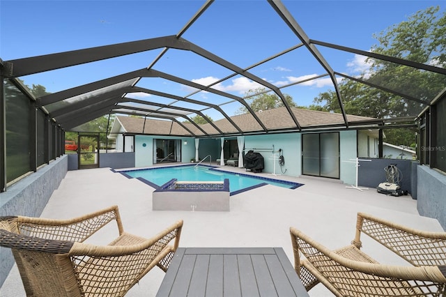 451 E Ireland Ct, Hernando, FL 34442 - outdoor pool featuring a patio, a hot tub, and glass enclosure