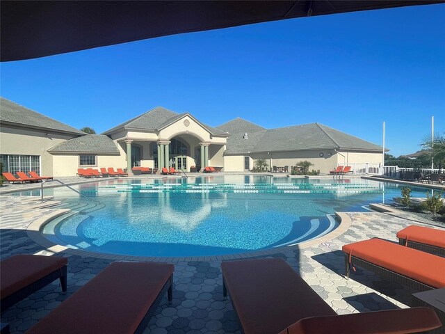 451 E Ireland Ct, Hernando, FL 34442 - community pool featuring a patio