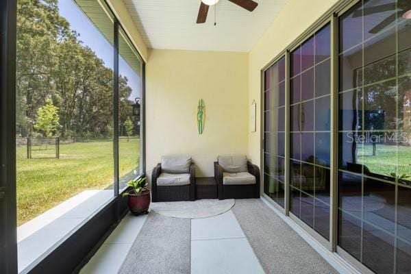 6235 SW 95th Pl, Ocala, FL 34476 - sunroom with a ceiling fan and plenty of natural light
