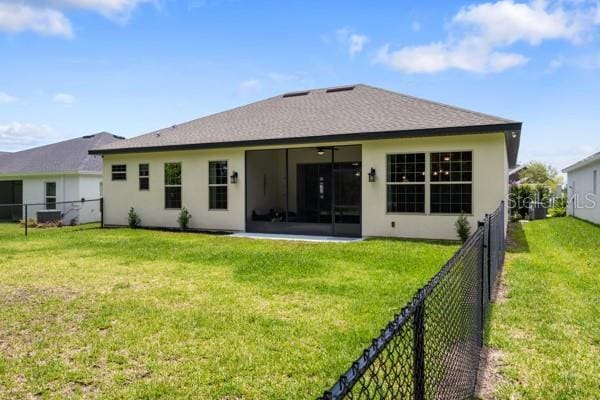 6235 SW 95th Pl, Ocala, FL 34476 - back of house featuring stucco siding and a sunroom