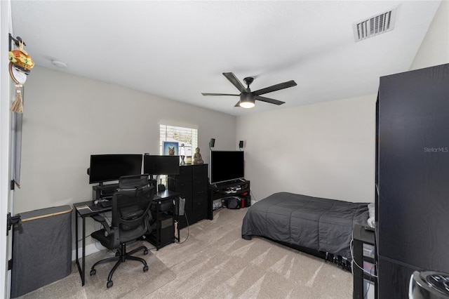 7442 SW 129th Ln, Ocala, FL 34473 - bedroom with carpet flooring, a desk, and a ceiling fan