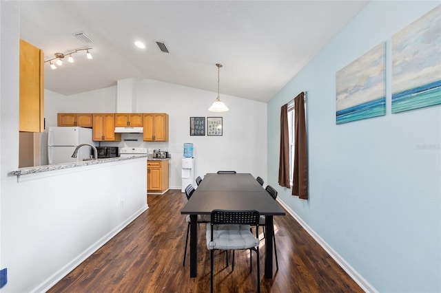 30 Bahia Trace Loop, Ocala, FL 34472 - dining room with vaulted ceiling, baseboards, and dark wood-style floors
