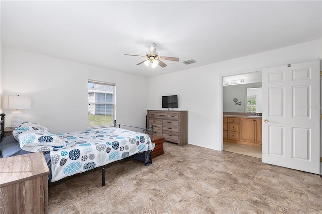30 Bahia Trace Loop, Ocala, FL 34472 - bedroom featuring ceiling fan and ensuite bath