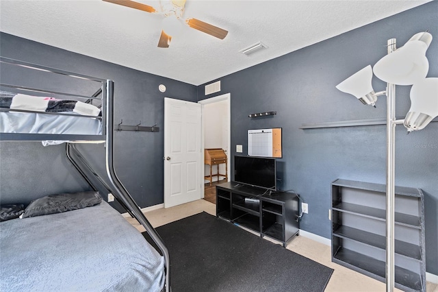 30 Bahia Trace Loop, Ocala, FL 34472 - carpeted bedroom with a textured ceiling, baseboards, and a ceiling fan