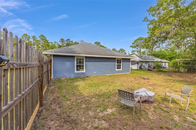 30 Bahia Trace Loop, Ocala, FL 34472 - back of property with a fire pit
