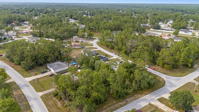 30 Bahia Trace Loop, Ocala, FL 34472 - aerial view of property and surrounding area with a heavily wooded area and nearby suburban area