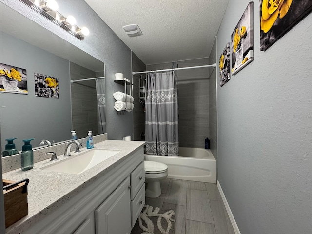 1100 NW 126th Ln, Citra, FL 32113 - full bathroom with vanity, toilet, a textured wall, shower / bath combo with shower curtain, and a textured ceiling