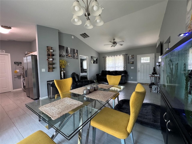 1100 NW 126th Ln, Citra, FL 32113 - dining space featuring lofted ceiling, a chandelier, ceiling fan, and baseboards