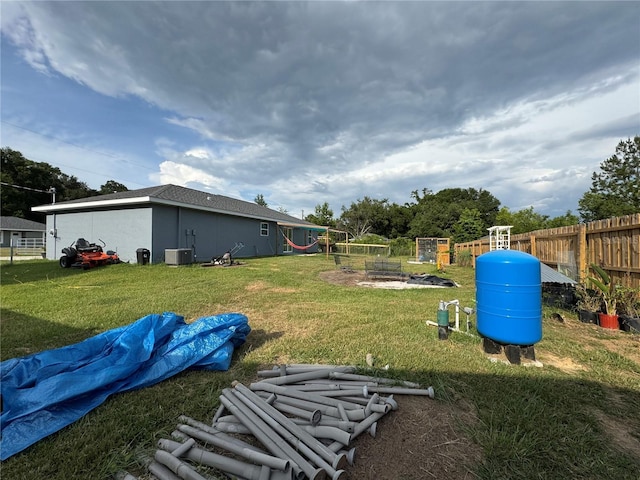 1100 NW 126th Ln, Citra, FL 32113 - view of yard featuring a vegetable garden and central air condition unit