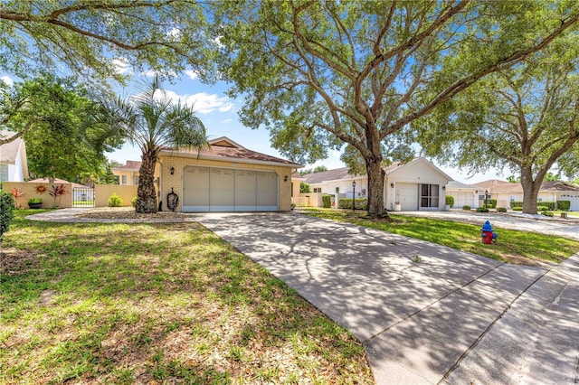 9266 SW 91st Cir, Ocala, FL 34481 - ranch-style home with concrete driveway, a garage, and brick siding