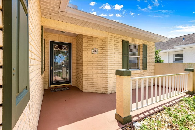 9266 SW 91st Cir, Ocala, FL 34481 - entrance to property with covered porch and brick siding