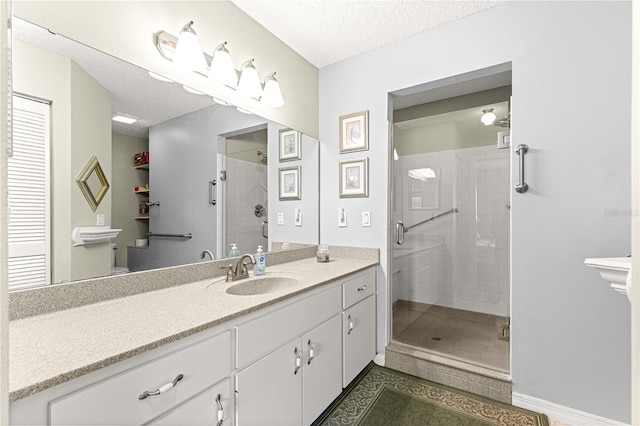 9266 SW 91st Cir, Ocala, FL 34481 - bathroom with a stall shower, a textured ceiling, and vanity