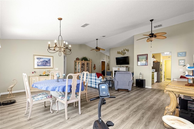 9266 SW 91st Cir, Ocala, FL 34481 - dining space featuring ceiling fan, light wood-style floors, lofted ceiling, a chandelier, and baseboards
