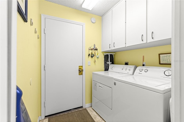 9266 SW 91st Cir, Ocala, FL 34481 - washroom with cabinet space, separate washer and dryer, and a textured ceiling