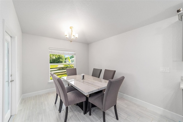 181 NW 45th Loop, Ocala, FL 34475 - dining space with a chandelier and baseboards