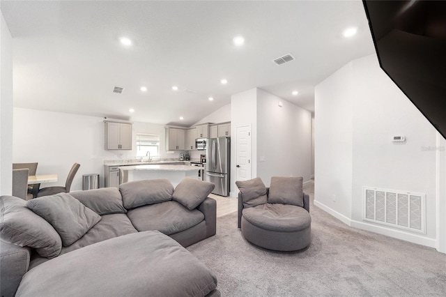 181 NW 45th Loop, Ocala, FL 34475 - living area featuring recessed lighting, light carpet, lofted ceiling, and baseboards