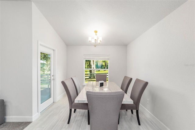 181 NW 45th Loop, Ocala, FL 34475 - dining space featuring baseboards and a chandelier