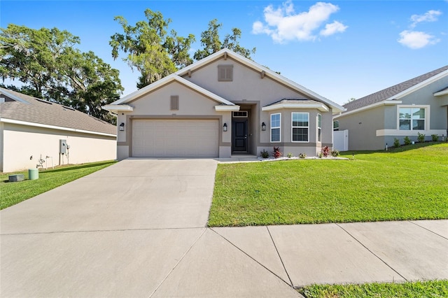 181 NW 45th Loop, Ocala, FL 34475 - view of front of property featuring driveway, a garage, stucco siding, and a front lawn