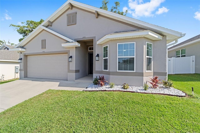 181 NW 45th Loop, Ocala, FL 34475 - view of front facade featuring stucco siding, an attached garage, and concrete driveway