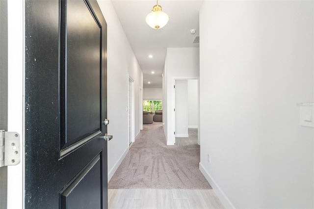 181 NW 45th Loop, Ocala, FL 34475 - entryway featuring recessed lighting, baseboards, and light colored carpet