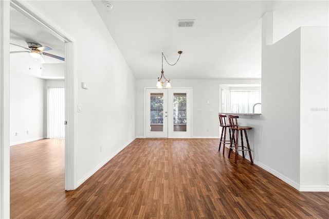 10016 SW 62nd Cir, Ocala, FL 34476 - empty room with french doors, wood finished floors, and baseboards