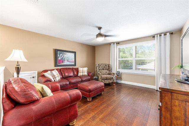 9170 SW 65th Loop, Ocala, FL 34481 - living room featuring a ceiling fan, dark wood-type flooring, and baseboards