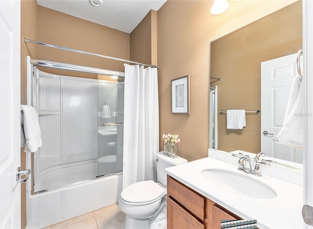 9170 SW 65th Loop, Ocala, FL 34481 - bathroom with shower / bath combo with shower curtain, vanity, toilet, and tile patterned floors
