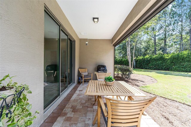 9170 SW 65th Loop, Ocala, FL 34481 - view of patio with outdoor dining area