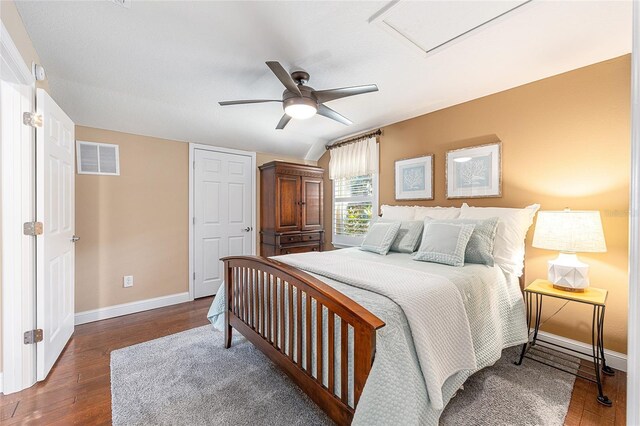 9170 SW 65th Loop, Ocala, FL 34481 - bedroom featuring baseboards, wood finished floors, and a ceiling fan