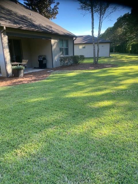 9170 SW 65th Loop, Ocala, FL 34481 - view of grassy yard