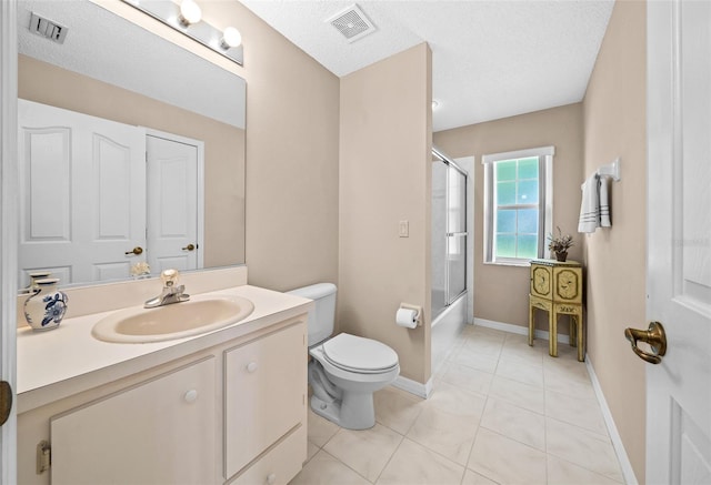 11147 SW 53rd Cir, Ocala, FL 34476 - full bathroom with toilet, vanity, bath / shower combo with glass door, baseboards, and tile patterned flooring