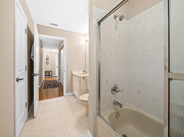 11147 SW 53rd Cir, Ocala, FL 34476 - bathroom featuring tile patterned flooring, shower / washtub combination, vanity, toilet, and baseboards