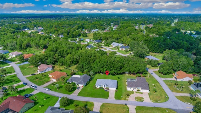 11147 SW 53rd Cir, Ocala, FL 34476 - aerial view of property and surrounding area featuring a heavily wooded area and nearby suburban area